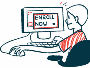 A person sits in front of a computer, with the words 