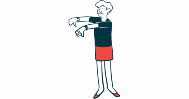 A person gives the thumbs-down sign with both hands.