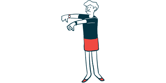 A person gives the thumbs-down sign with both hands.